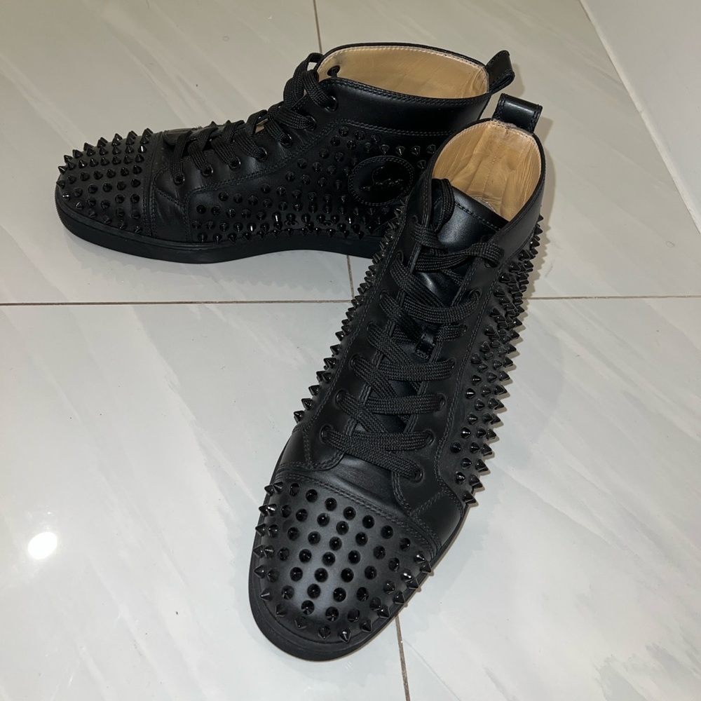 Christian loubaton High top studded shoes